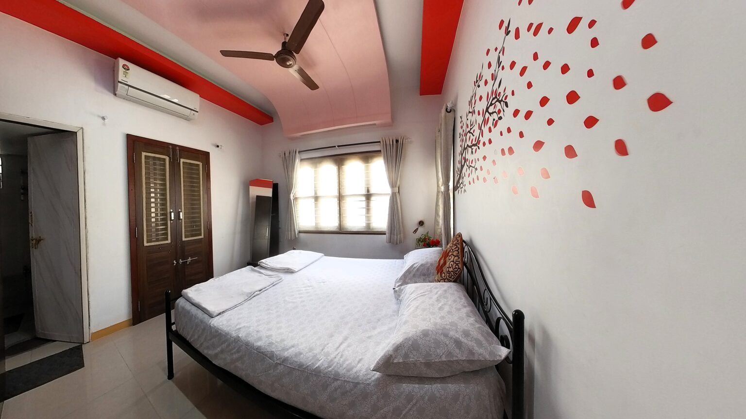 Seating area on the private attached balcony of Bedroom 2