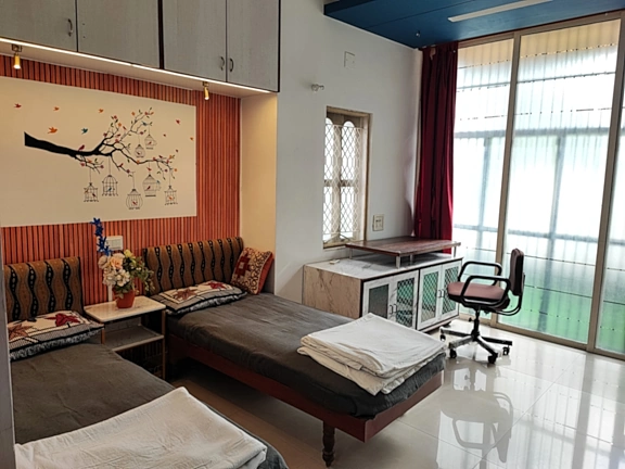 Bedroom 3 looking out to Balcony 3 through glass sliding partition